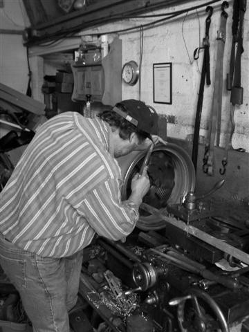 man on lathe